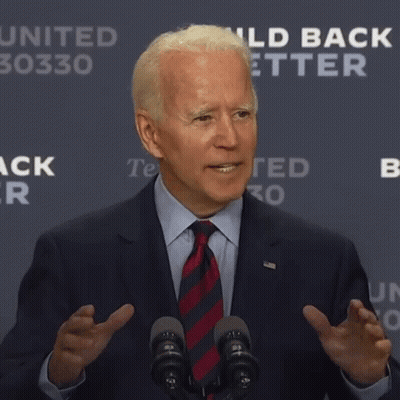 Suit-Wearing Man At Microphone Says He's A Fraud GIF