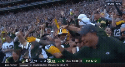Suited Man Kicking Man On Sidewalk GIF
