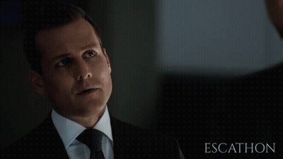Suited Man Looking At Another Escathon GIF
