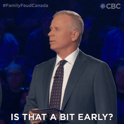 Suited Man Says Is That A Bit Early GIF