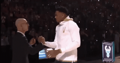 Suited Man Shakes Hands Basketball Player White Shirt GIF