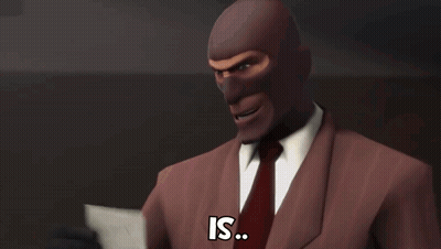 Suited Masked Man Asks What The Hell GIF
