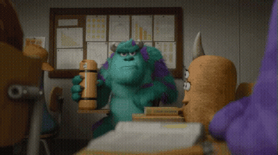 Sulley From Monsters Inc Is Holding A Hammer In His Hand GIF