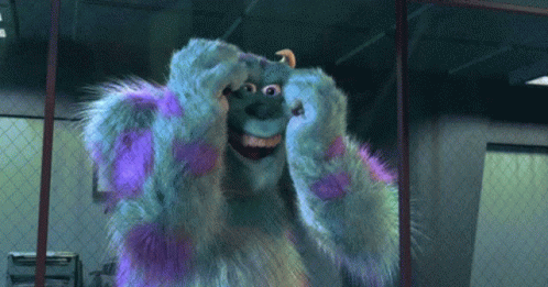 Sulley From Monsters Inc Is Making A Face With His Hands GIF