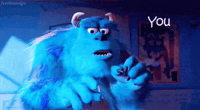Sulley From Monsters Inc Is Making A Funny Face And Pointing At The Camera . GIF