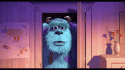 Sulley From Monsters Inc Is Standing In The Doorway GIF