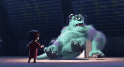 Sulley From Monsters Inc Is Standing Next To A Girl In A Red Shirt . GIF