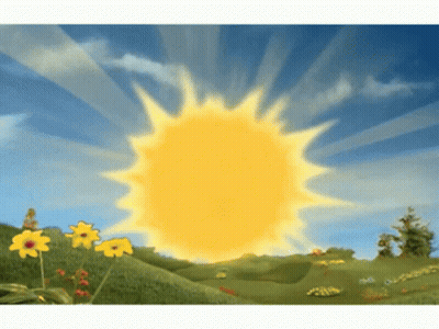 Sun Shining Over Flower Field GIF