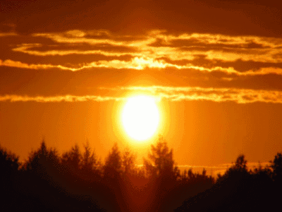 Sun Shining Through Clouds In Sky GIF