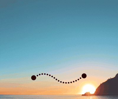 Sun Shining Through Clouds Over Mountains GIF