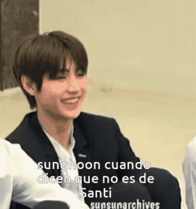 Sunghoon Smiling And Laughing In Chair GIF