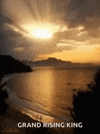 Sunset Over Ocean With Sun Through Clouds GIF