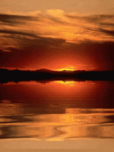 Sunset Over Water With Mountains GIF