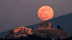 Super Moon With Face In Greece GIF