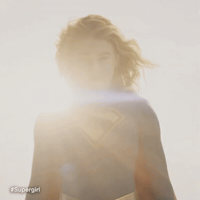 Supergirl Costume Woman Facing Sun GIF