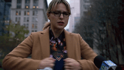 Supergirl Shirt Under The Coat GIF