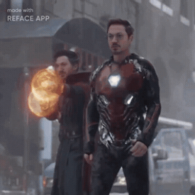 Superhero And Wizard Holding Fireball GIF