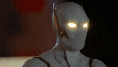 Superhero Close Up With Yellow Eyes GIF