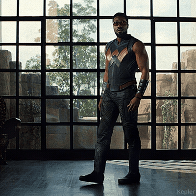Superhero In Costume In Front Of Window With Kepler GIF