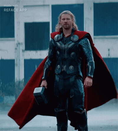 Superhero Man Holding Hammer And Reface Cape GIF
