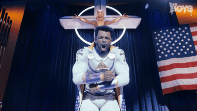 Superhero Man In Front Of Flag And Cross GIF