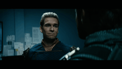 Superhero Man Looking At Papers GIF