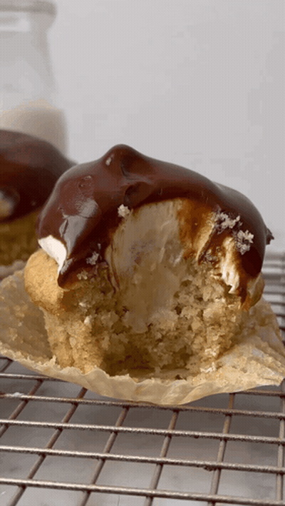 Superhero Smiling Holding Cake GIF