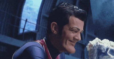 Superhero Smiling Holding Cake GIF