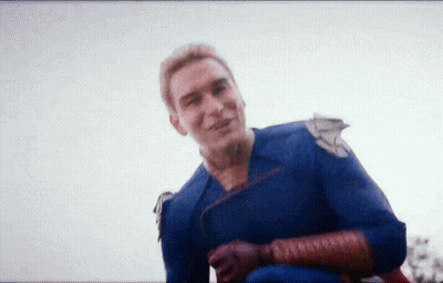 Superhero Smiling On Bench GIF