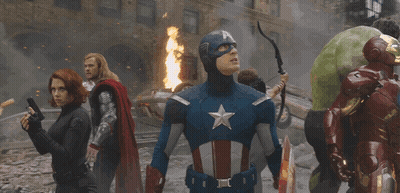 Superheros Including Captain America Standing Before Fire GIF