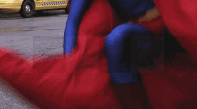 Superman Costume Man Fighting Another Man GIF