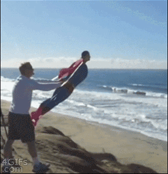 Superman Flying At The Beach GIF