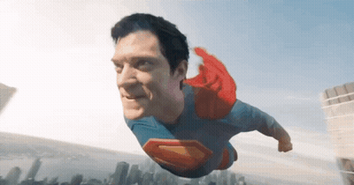 Superman Flying Over City GIF