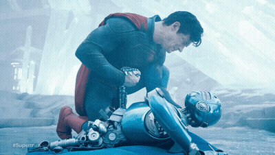 Superman Kneeling Next To Robot #Superman GIF