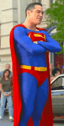 Superman Speaking With His Hands Folded