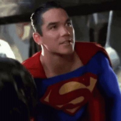 Superman Talking To Another Man GIF