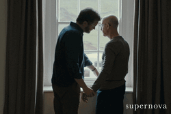 Supernova Stanley Tucci Holding Hands GIF