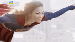 Superwoman Happily Flying GIF