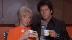 Sure Jan Drinking Tea Suspicious GIF