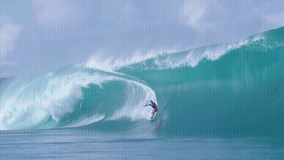 Surfer Riding A Wave GIF
