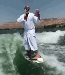 Surfing Man Shaving Beard GIF