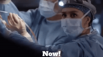 Surgeon In Mask And Gloves Operating Saying Now GIF