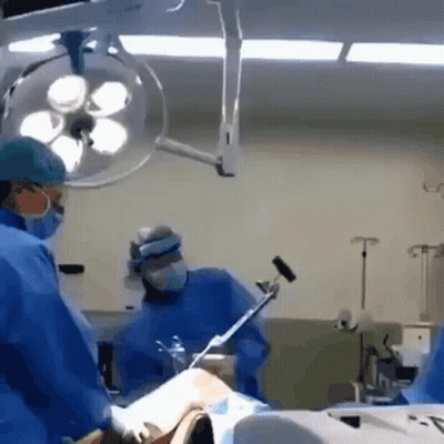 Surgeon Operating On Patient GIF