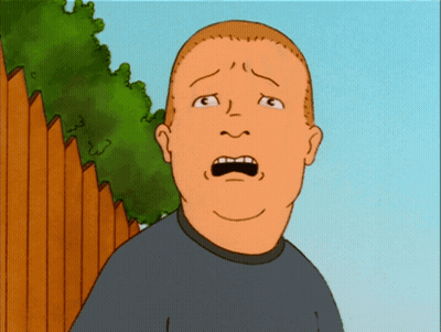 Surprised Cartoon Character In Front Of Wooden Fence GIF