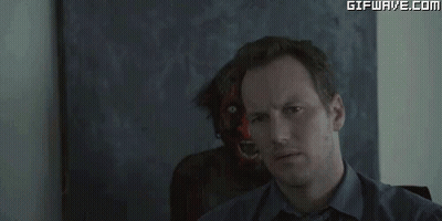 Surprised Cartoon Character Next To Man GIF