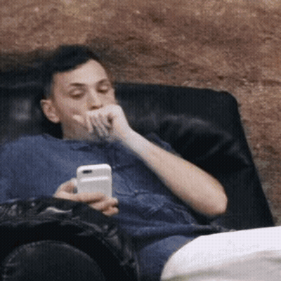 Surprised Cat On Couch Under Starttamilchat.in Sign GIF