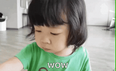 Surprised Little Girl In Green Shirt GIF