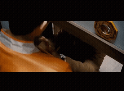 Surprised Man Behind Woah Sign GIF