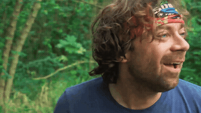 Surprised Man In Blue Shirt And Headband GIF