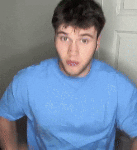 Surprised Man In Blue Shirt GIF